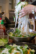 Mixing Rice Noodle Salad By Hand