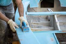 Hand Sanding Sailboat Deck For Painting Finish Restoration