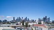 © Rowena Naylor/Stocksy - Melbourne city skyline and industrial area of West Melbourne