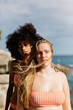 © Marc Bordons/Stocksy - Portrait of two women in swimsuit.