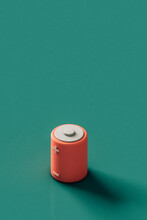 Pink Rechargable Batteries On A Green Background. 3d Render