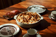 © ChaoShu Li/Stocksy - Closeup homemade home western meal on wooden table