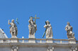 Very big Statue of Resurrected Jesus and more statues on the facade of the Basilica of Saint Peter in Vatican