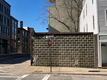 Urban Neighborhood Street Wall With One Way Sign