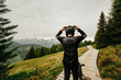 © Michael Kotowski/Stocksy - Mountainbiker is putting on his goggles