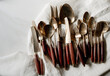 © Minette Hand/Stocksy - Bronze Cutlery