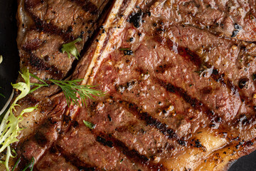 Wall Mural - Closeup on juicy grilled beef steak texture background