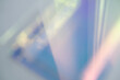 © yavdat - blurred soft rainbow light flares background or overlay. double exposure. blurry reflection of the sky in the window