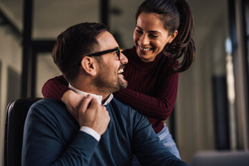 Wall Mural - Smiling people, beautiful couple, smiling and looking at each other.