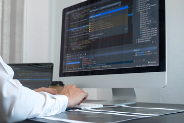 Programmer, Man working with computer programming, professional development, and coding technology, working on high-quality visual software development websites