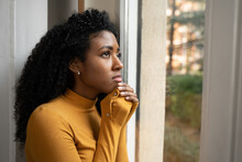 One Black Woman Depressed In Front Of Window