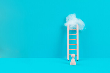 Man is standing next to a ladder, climbing up in career, having a goal, brainstorming for ideas, success strategy, taking a challenge, business concept