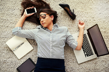 Aufkleber - She just couldnt keep up with all the demands. High angle shot of a stressed out businesswoman sleeping on the floor in an office.