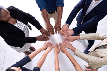 Aufkleber - Theyve unlocked the secret to success. High angle shot of a group of unidentifiable businesspeople making a circle with their hands in the office.