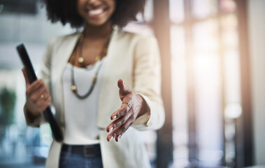 Canvas Print - Welcome to the team, Ill show you around the office. Shot of an unrecognizable businesswoman reaching out for a handshake.