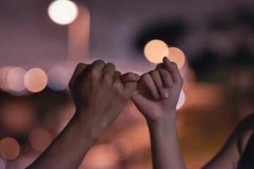 Poster - Locked in love. Cropped shot of two unrecognizable people holding hands.