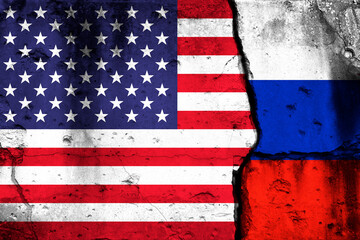 Wall Mural - United States and Russia crisis. Background with national flags on cracked wall photo