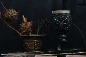 Canvas Print - Satanic chalice for black mass preparation. dark background wallpaper.