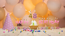 Beautiful Background Happy Birthday Number 48 With Burning Candles, Birthday Candles Pink Letters For Forty Eight Years. Festive Background With Balloons.