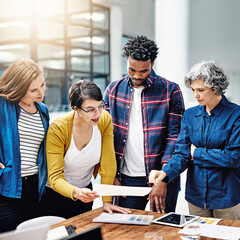 Aufkleber - These drafts are looking quite accurate so far. Cropped shot of a group of creatives having a meeting in a modern office.
