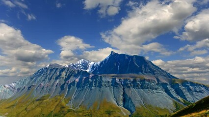 Wall Mural - majestic mountain landscape time lapse scene