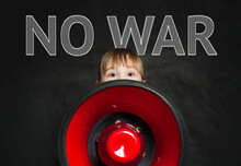 Stop War Concept. Child Holding Red Loudspeakeron Blackboard Background