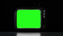 Turn on the retro TV with noise at the beginning, and switch to a green screen. night horror climate