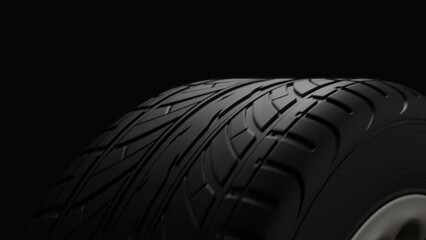 Wall Mural - 4K Animation. Close up perspective view on a black car tire in motion cyclic. 3d Render