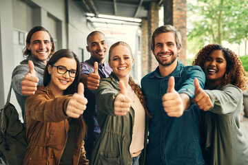 Aufkleber - Say yes to an education. Portrait of a group of happy young students giving thumbs up together on campus.
