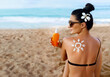 © verona_studio - Beauty Portrait of gorgeous woman in bikini with the drawn sun on a shoulder at beach