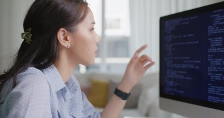 Chronic burnout in software engineer tired solving problem fix bug work hard at home office desk. Coder job for young asian talent woman cloud computing cyber security reskill upskill for workforce.