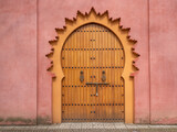 Fototapeta Desenie - Wooden gate. Ancient gates with iron handles.