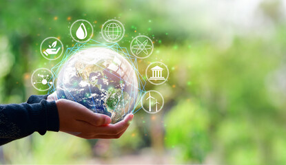 Wall Mural - little girl holding earth in her hand, esg icon concept in the hand for environmental, social, earth
