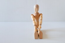 Wooden Doll As A Model For Exercising In A Healthy Life