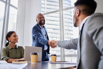 Fototapete - Are you ready to get started. Shot of two business people shaking hands during a meeting.
