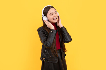 Wall Mural - child in modern earphones. online education. back to school.