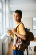 © Drazen - Portrait of black elementary students in the classroom looking at camera.