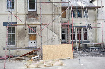 Wall Mural - Scaffolding surrounding house development for safe access to construction work