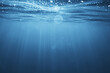 Leinwandbild Motiv ocean underwater rays of light background, under blue water sunlight