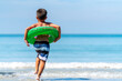 © CandyRetriever  - Little Asian boy in swimwear and swim ring playing in sea water on tropical beach in summer sunny day. Happy little child boy enjoy and fun outdoor activity lifestyle on travel vacation at the sea