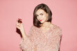 © Sergey Chumakov - young fashion smiling woman with Bob haircut in pink dress isolated on pink background