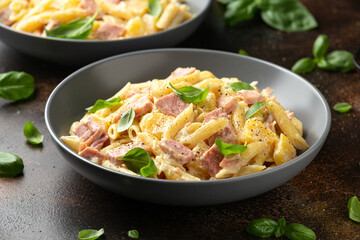 Wall Mural - Hawaiian pasta with ham, pineapple and creamy cheese.