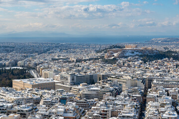 Wall Mural - Athens covered in snow,  view from Lycabettus hill after heavy snowfall