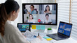 © ChayTee - Happy smile asia young woman learn mba college class on wifi webcam video call in desktop pc screen with cowork friend workforce group talk in sale report. Smart job work at home for staff workspace.