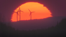 Three Green Energy Wind Turbines Spinning Against A Sunset Or Sunrise For Renewable Power (3d Illustration)