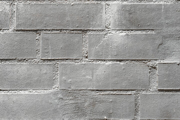 Old vintage gray brick wall texture background.