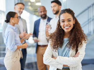 im always eager to make success happen. portrait of a young businesswoman standing in an office with