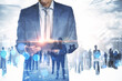 © Who is Danny - Businessman using tablet with abstract crowd of businesspeople standing on abstract bright city background. Teamwork and success concept. Double exposure.