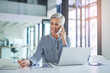 © Nikish Hiraman/peopleimages.com - Nothing beats receiving some good news. Shot of an attractive mature businesswoman taking a phone call at her office desk at work.