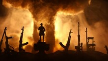 Creative Artwork Decoration - Russian War In Ukraine Concept. Road And Giant Weapons With Giant Explosion Of Nuclear Bomb. Selective Focus